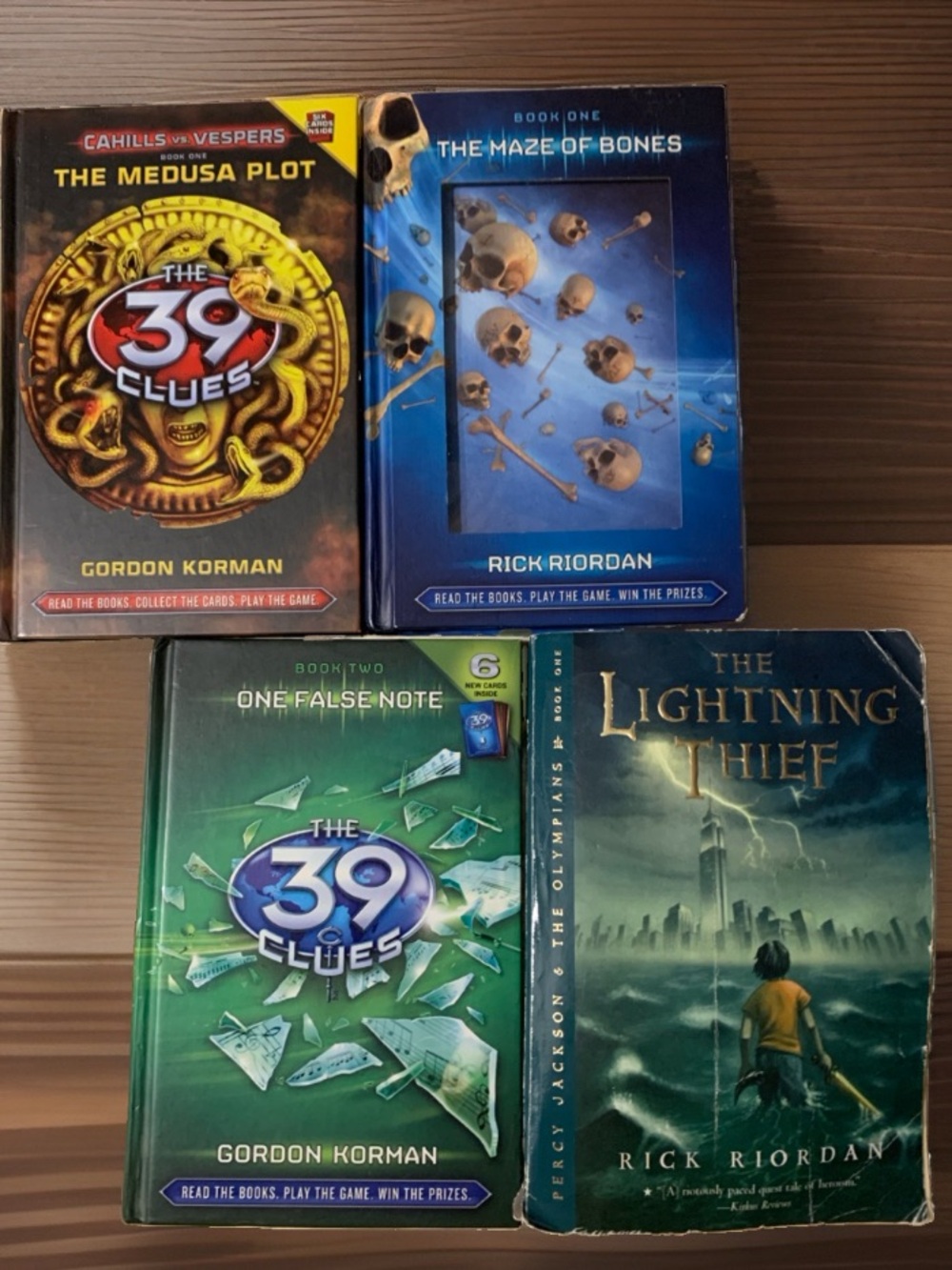 Set of 4 Middle-Grade Adventure Books -2/Riordan & 2/39 clues Korman